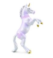 Młody stojący różowy jednorożec