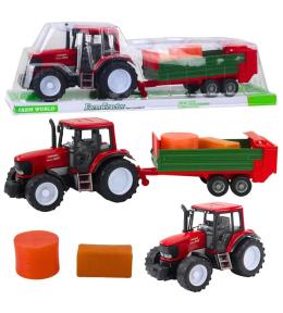 Traktor rolniczy z przyczepą zieloną