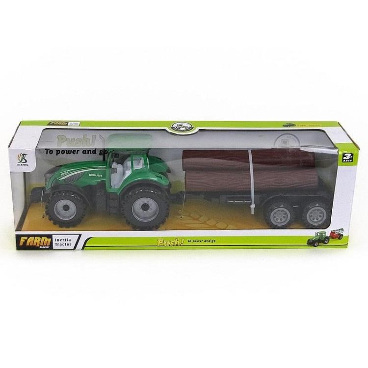 Traktor z przyczepą i drzewem