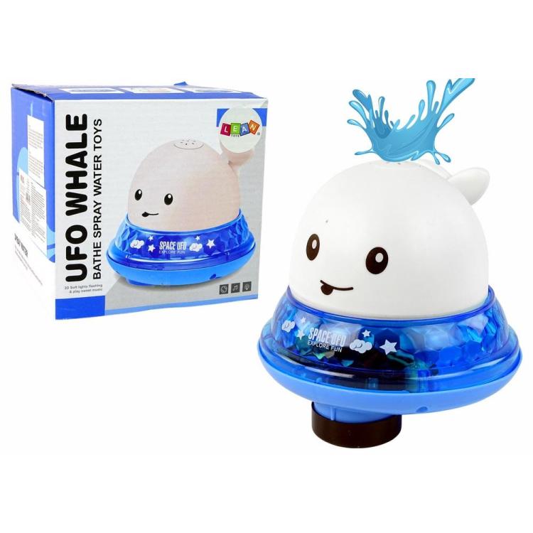 Wieloryb tryskający wodą biały