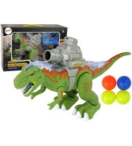 Dinozaur z katapultą chodzi i strzela zielony