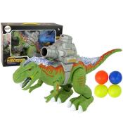 Dinozaur z katapultą chodzi i strzela zielony