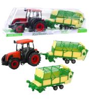 Traktor rolniczy z przyczepą zielono-żółtą