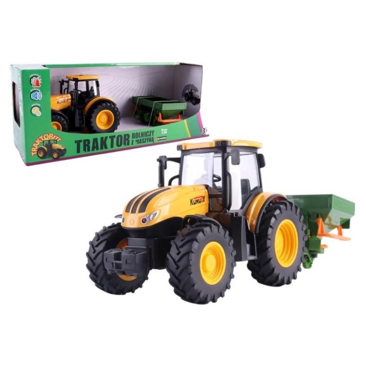 Traktor rolniczy z rozsiewaczem