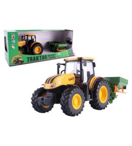 Traktor rolniczy z rozsiewaczem