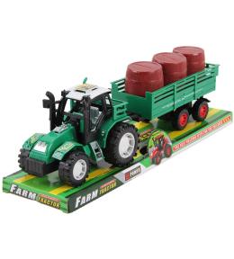 Traktor z przyczepą i beczkami